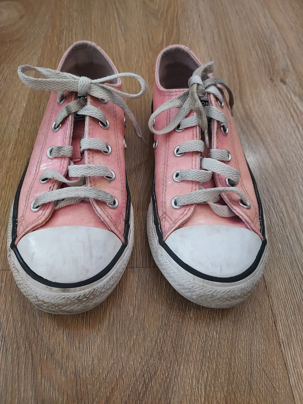 Pair Of Converse Girls Pink Canvas Sneakers And Gold Knot Sandals